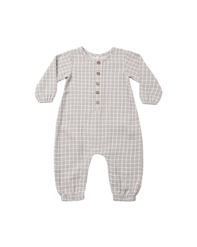 A baby long-sleeve footless one-piece romper in a blue gingham pattern, featuring a button-up front with brown buttons.