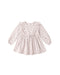 A long sleeve dress in classic pointelle fabric and features delicate v-ruffle detailing, a button-back closure for easy changing, and matching bloomers.