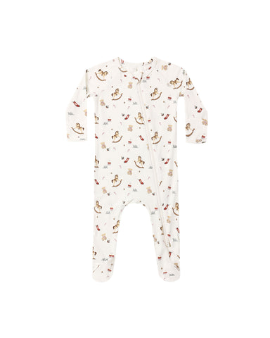 A baby long-sleeve footed sleeper in off-white with a repeating print of teddy bears, rocking horses, and small red hearts, shown flat against a white background.