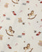 A close-up of a fabric pattern featuring Christmas toys and holiday motifs, including rocking horses, teddy bears, stockings, candy canes, and toy trains on an off-white background.