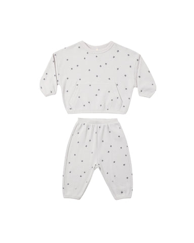 A two-piece set featuring a relaxed long sleeve top with a roomy front pocket and matching pants for easy movement