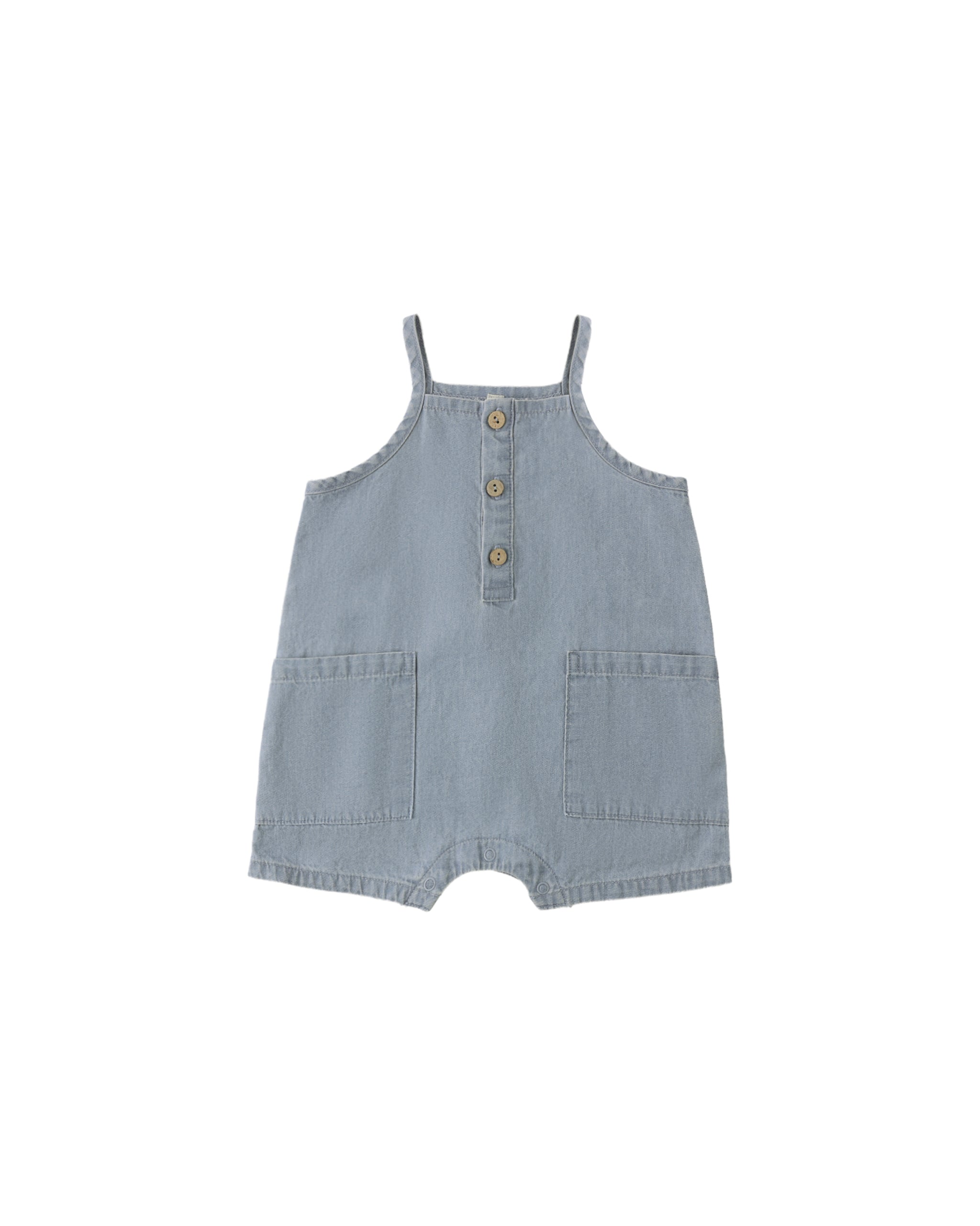 Light blue denim romper with button details on a white background