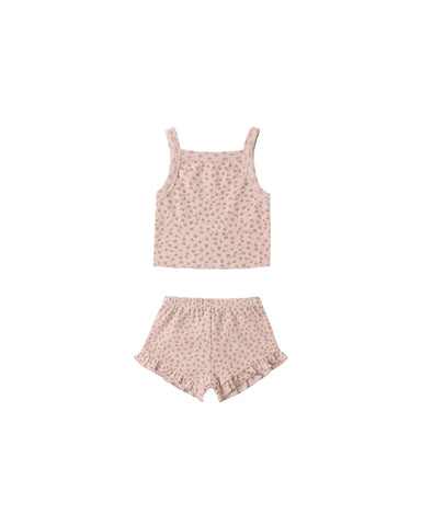 Pink children's tank top and shorts set with a subtle pattern on a white background