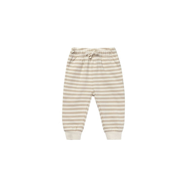 cream and tan colored sweatpants with drawstring waistband
