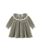 A toddler girl's long-sleeve dress in sage green velvet, featuring a large white ruffled collar with lace trim and matching lace trim on the elasticized cuffs.