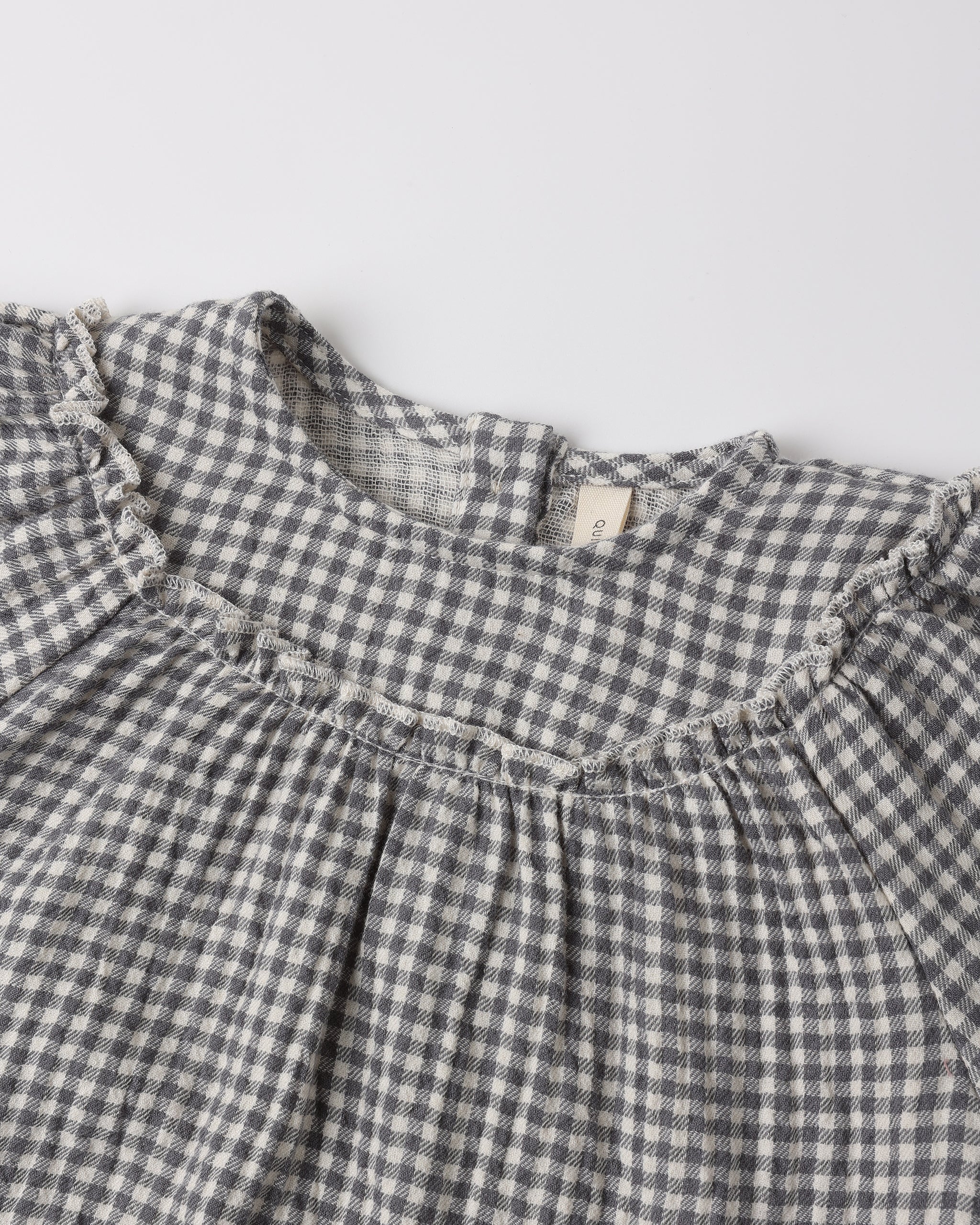 Close up of a black gingham shirt
