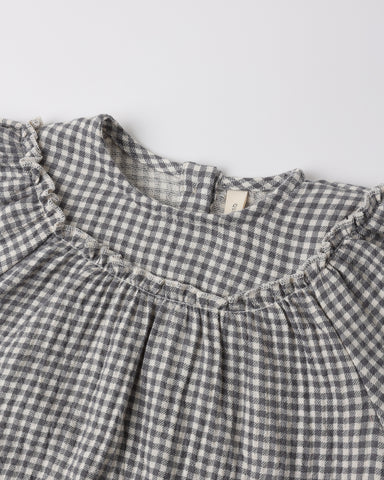 Close up of a black gingham shirt