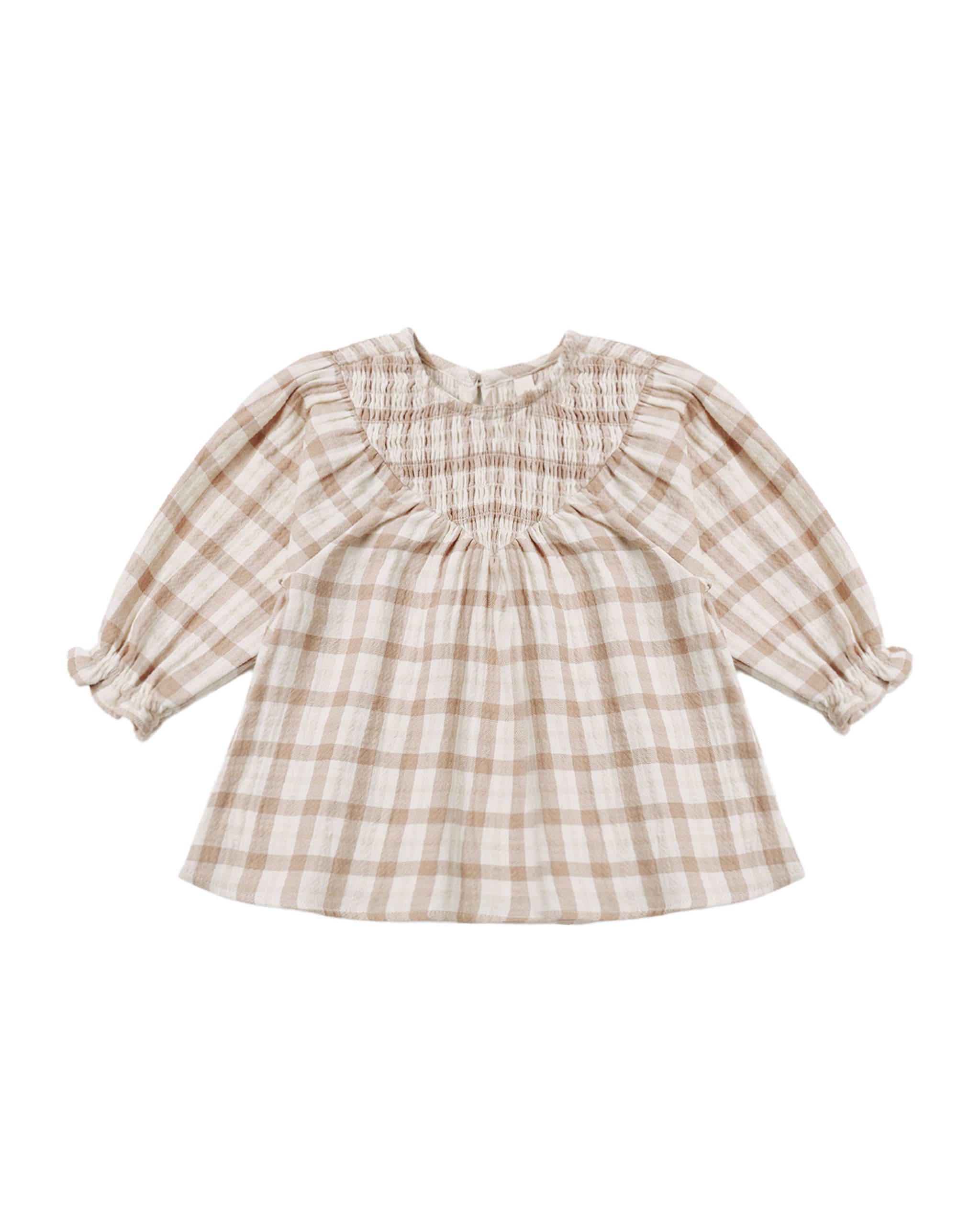 A toddler girl's long-sleeve dress featuring a beige and white gingham plaid pattern, a smocked round neckline, and ruffled cuffs, shown flat on a white background.