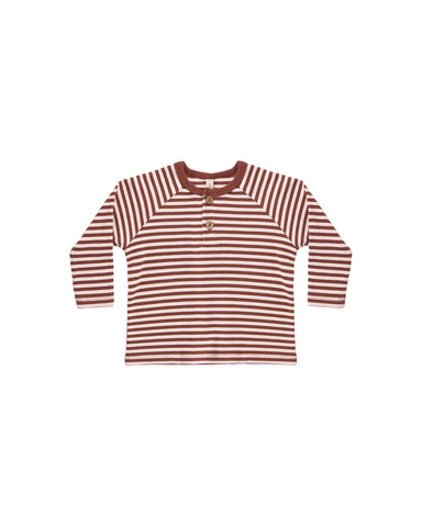 A long-sleeve baby henley shirt with horizontal rust red and cream stripes, featuring a three-button placket, displayed flat against a solid white background.