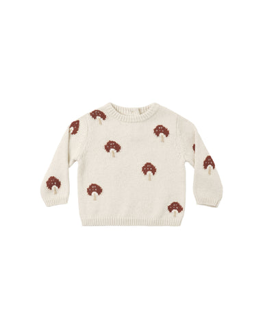 An off-white knit baby sweater featuring an all-over pattern of small brown and white embroidered mushrooms, displayed flat against a solid white background.