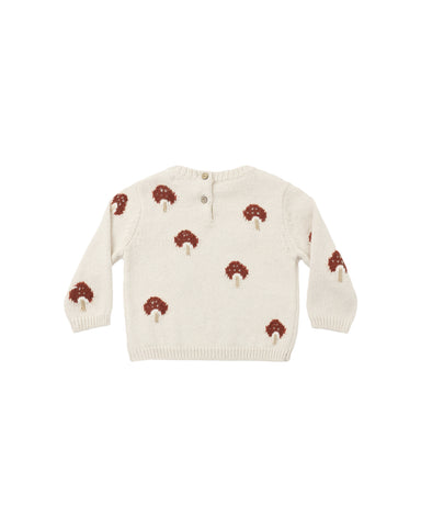 An off-white knit baby cardigan featuring an all-over pattern of small brown and cream mushrooms, displayed flat against a solid white background.