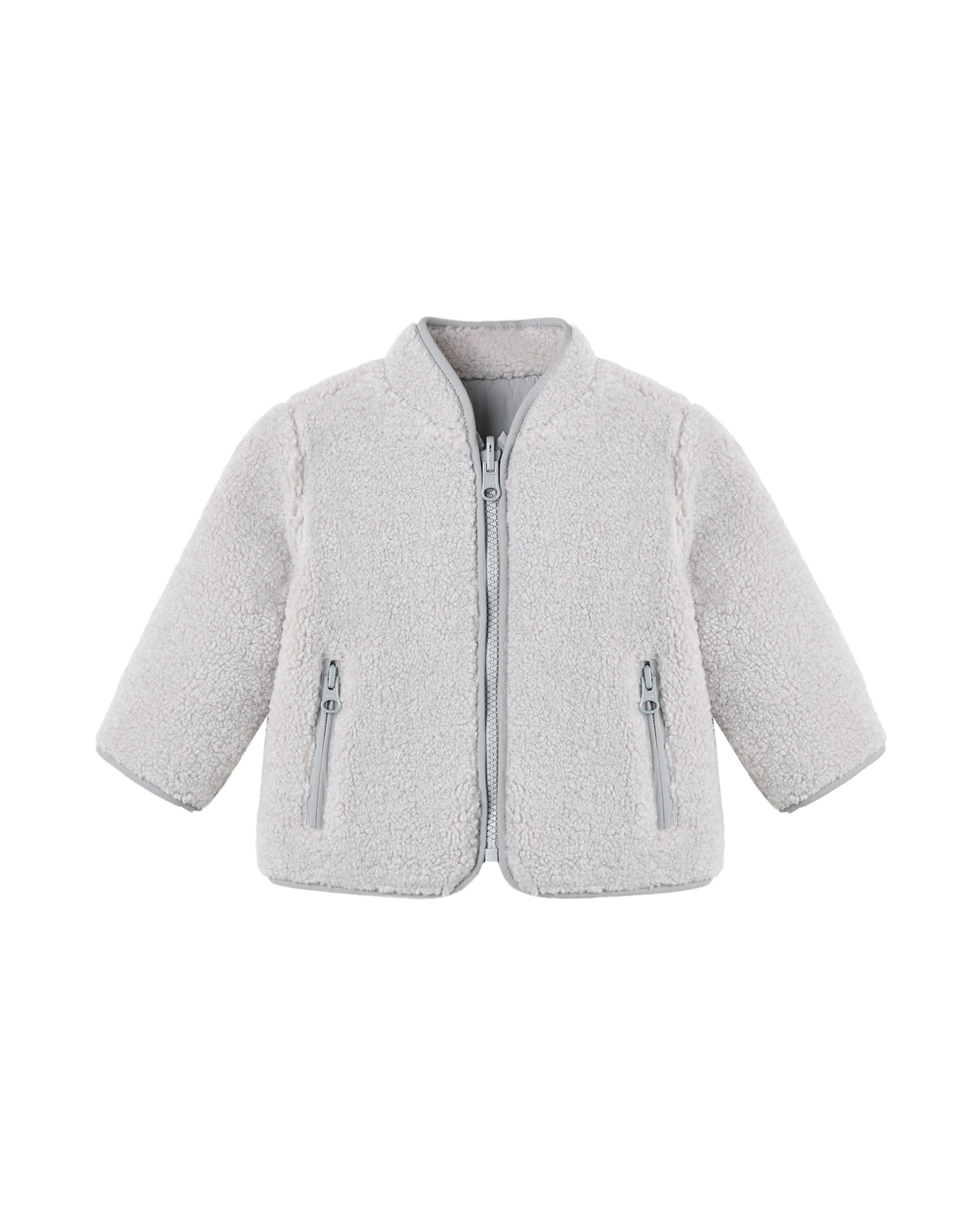 Light gray fleece jacket with zippers on a white background