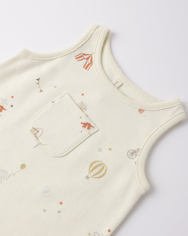 Baby romper with carnival print on a white background