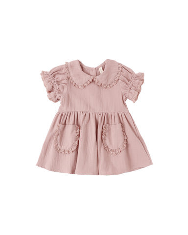 Mauve dress with ruffled collar and pockets on a white background