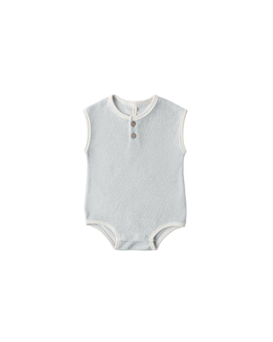 Sky blue terry cloth sleeveless baby romper with buttons on a white background