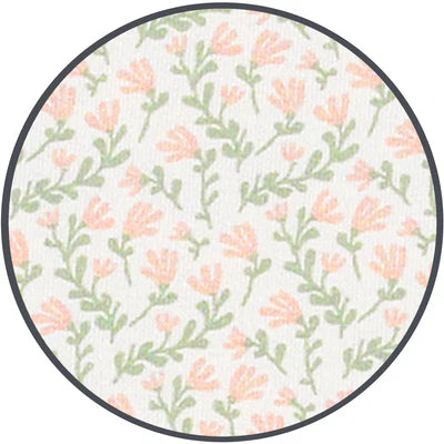 Round fabric sample with floral pattern on a white background
