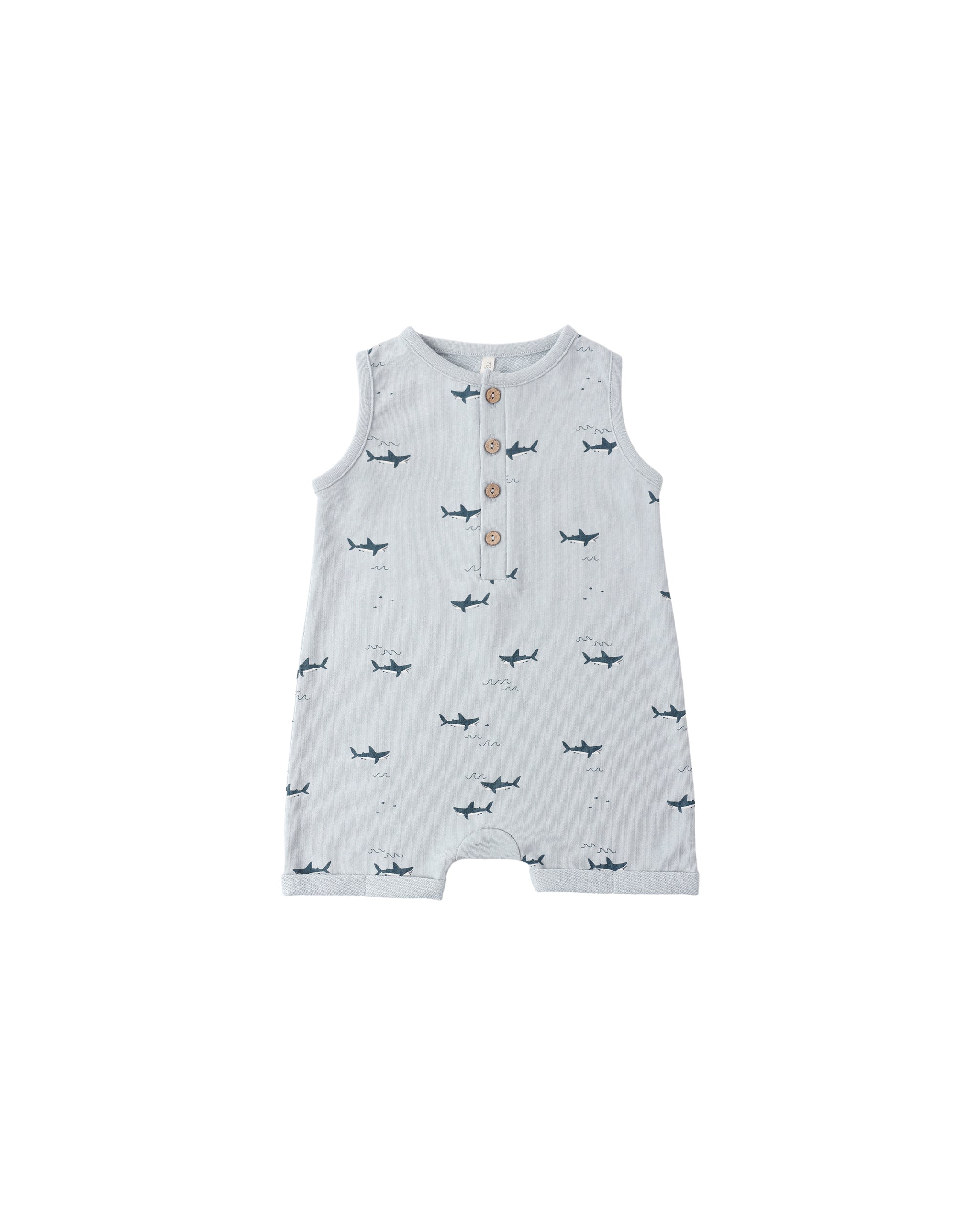 Baby romper with shark pattern on a white background