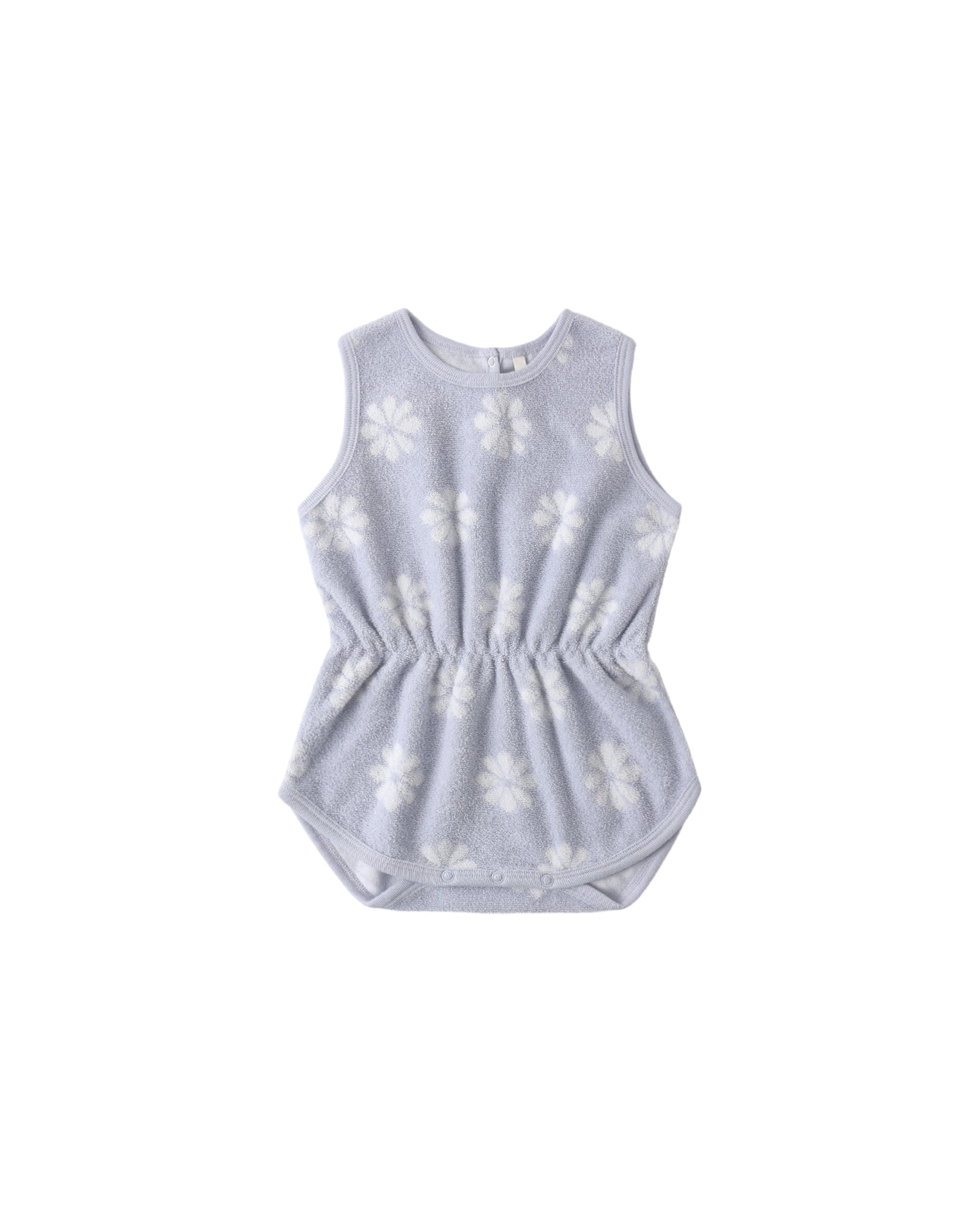Perwinkle baby romper with white floral patterns on a white background