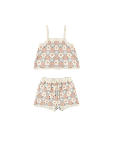 Floral patterned top and shorts set on a white background