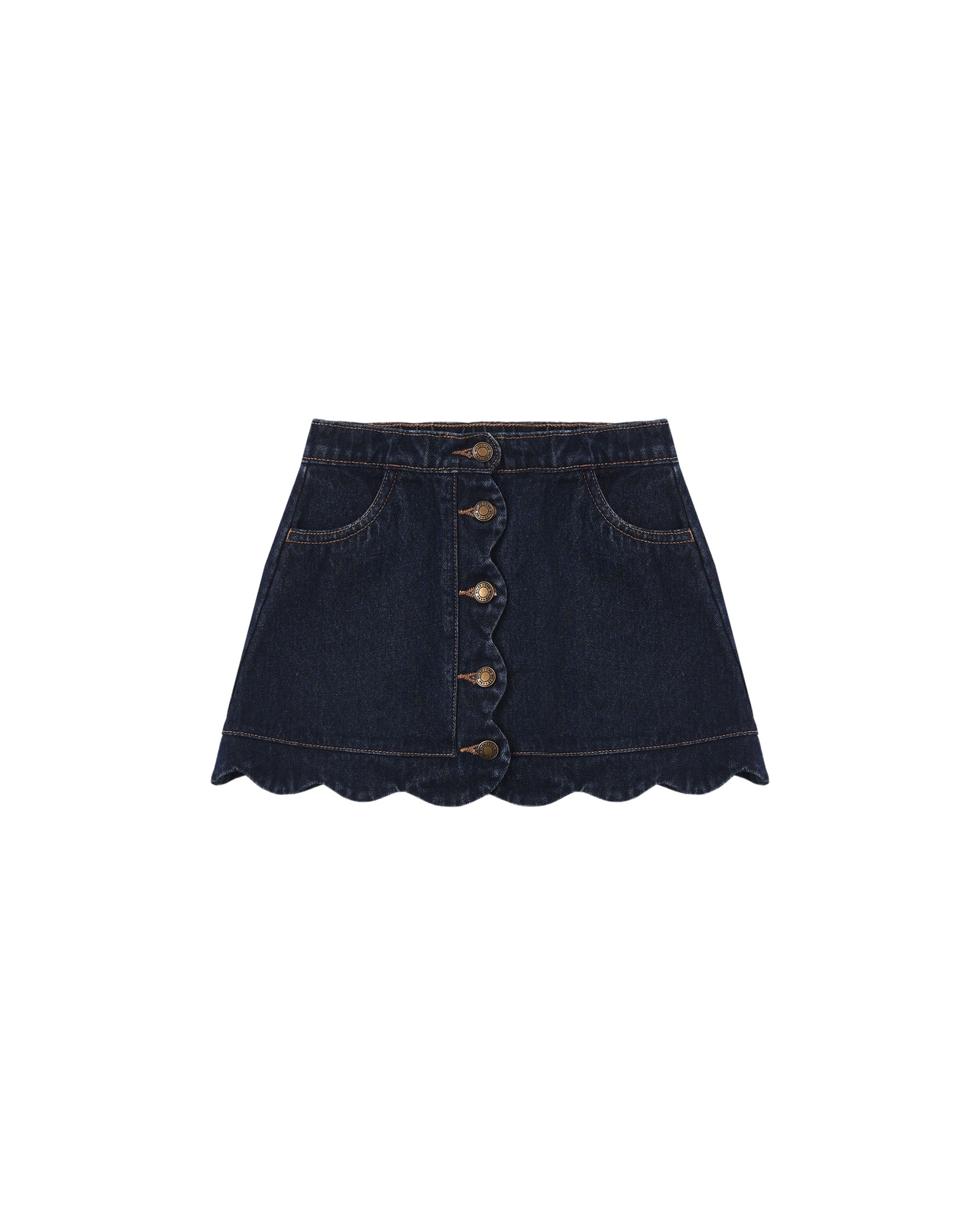 An indigo colored denim skirt with scalloped edge and brass buttons down the front.