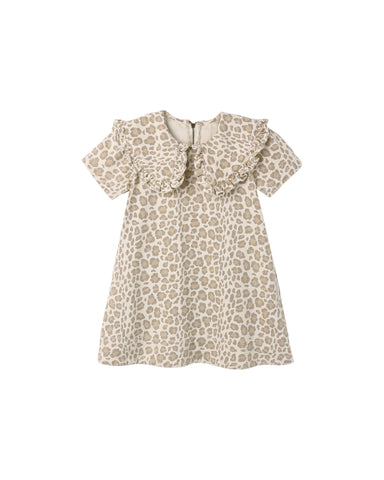 A light natural colored leopard print dress with an oversided color and short sleeves on a white background.