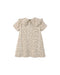 A light natural colored leopard print dress with an oversided color and short sleeves on a white background.