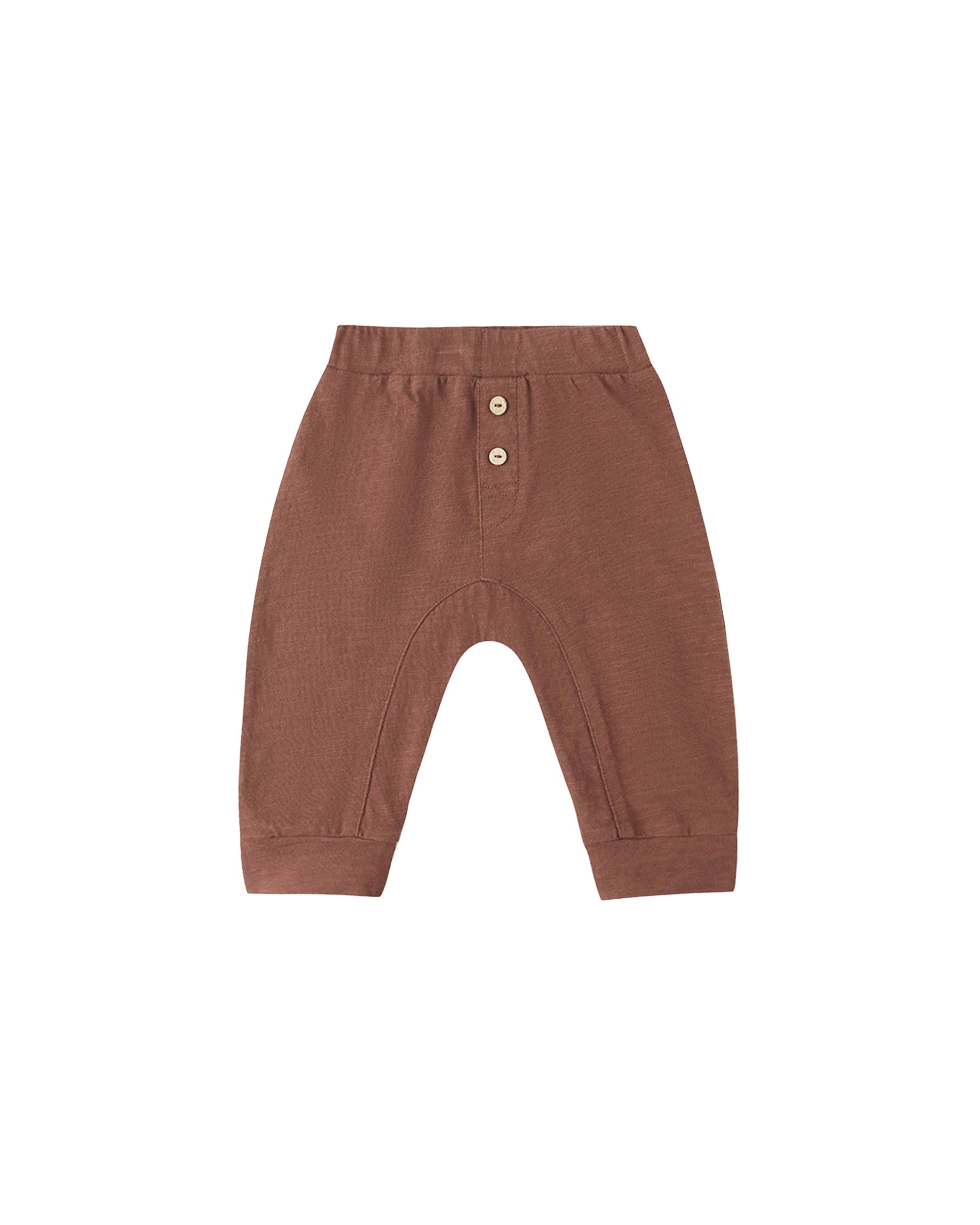 A pair of toddler knit pants in a warm terracotta brown color, featuring a buttoned henley waistband with two small buttons and a curved leg design, shown on a plain white background.
