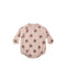 A baby long-sleeve romper in a dusty pink color, decorated with a repeating pattern of dark brown flowers with light gray centers, shown against a plain white background.