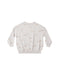 An off-white crewneck sweatshirt featuring a delicate all-over print of small brown foxes and tiny scattered dots, displayed flat against a solid white background.