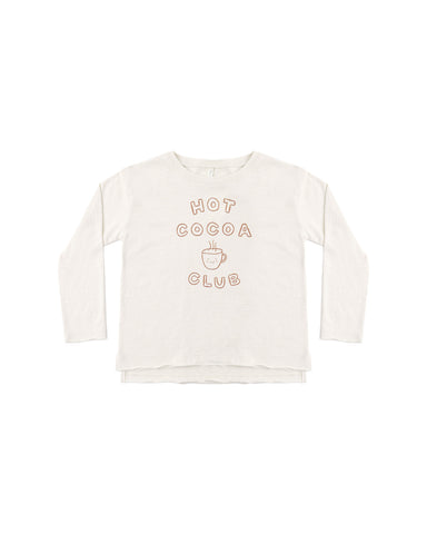 A natural colored long sleeve tee with a Hot Cocoa Club logo on the front.