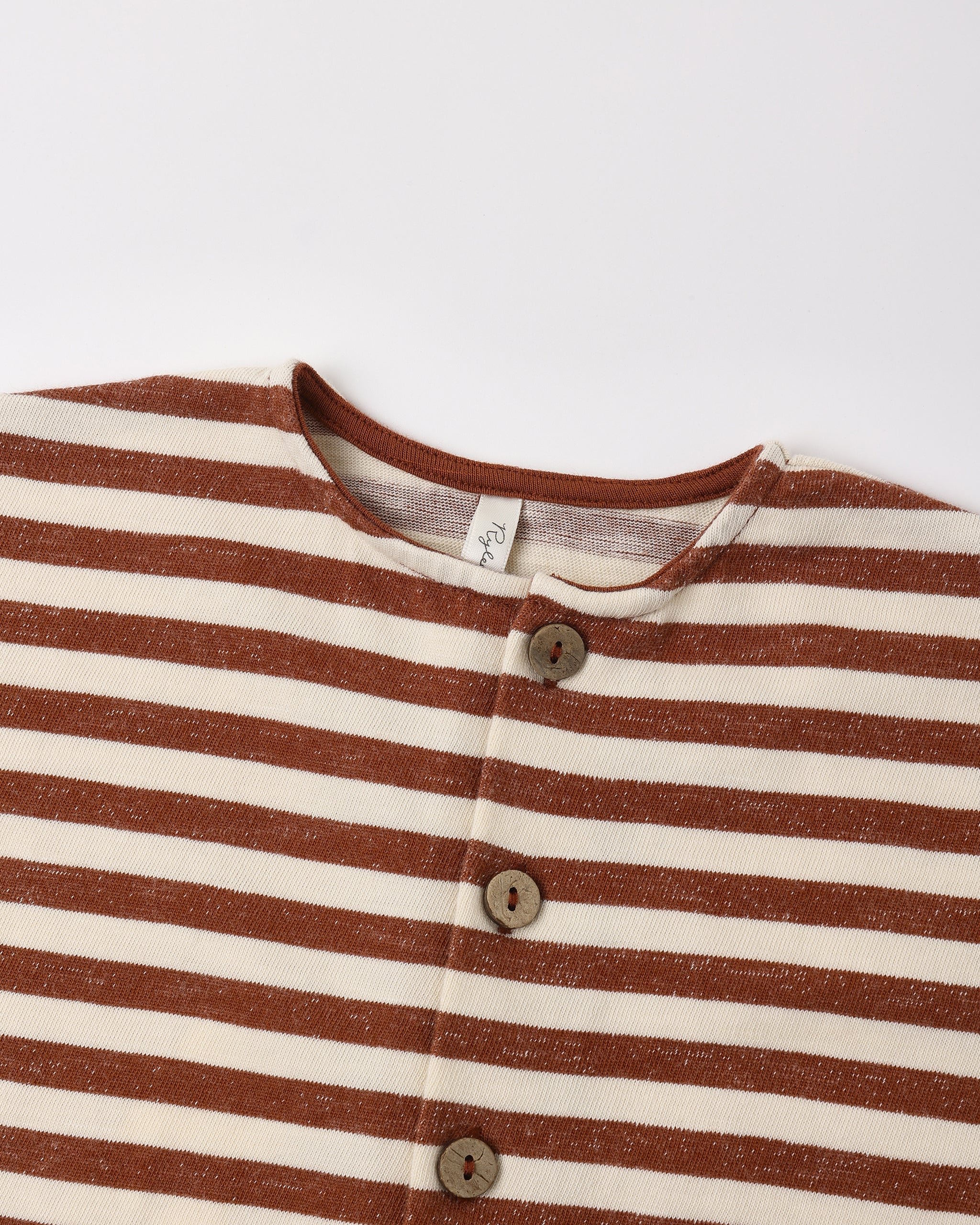 A close up of a brown and white striped romper with a button up front on a white background.