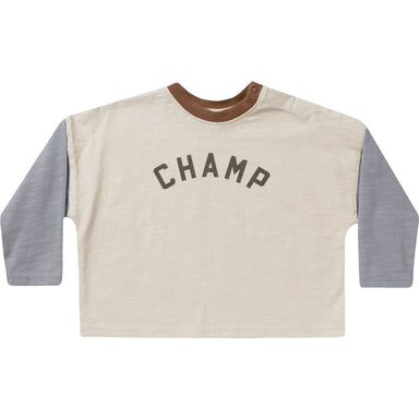 long sleeve cream colored baseball tee with dusty blue arms and graphic "champ" in the middle