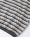 Close-up of a striped knit garment, likely a shirt or sweater sleeve, featuring horizontal stripes in charcoal gray, cream, and tan, with a dark gray ribbed collar.