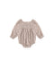 A baby long-sleeve romper with a dense beige and brown floral pattern, featuring a smocked bodice and ruffled sleeves, shown flat on a white background.