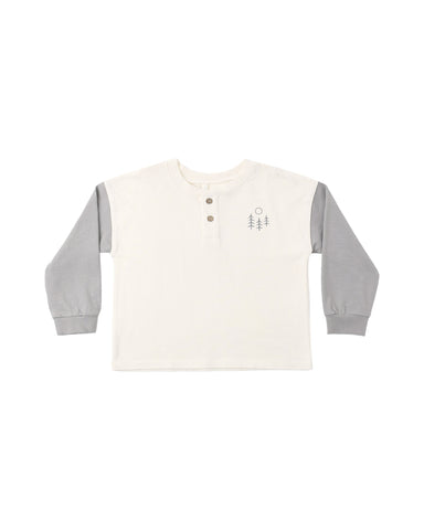 An ivory henley tee with grey long sleeves on a white background