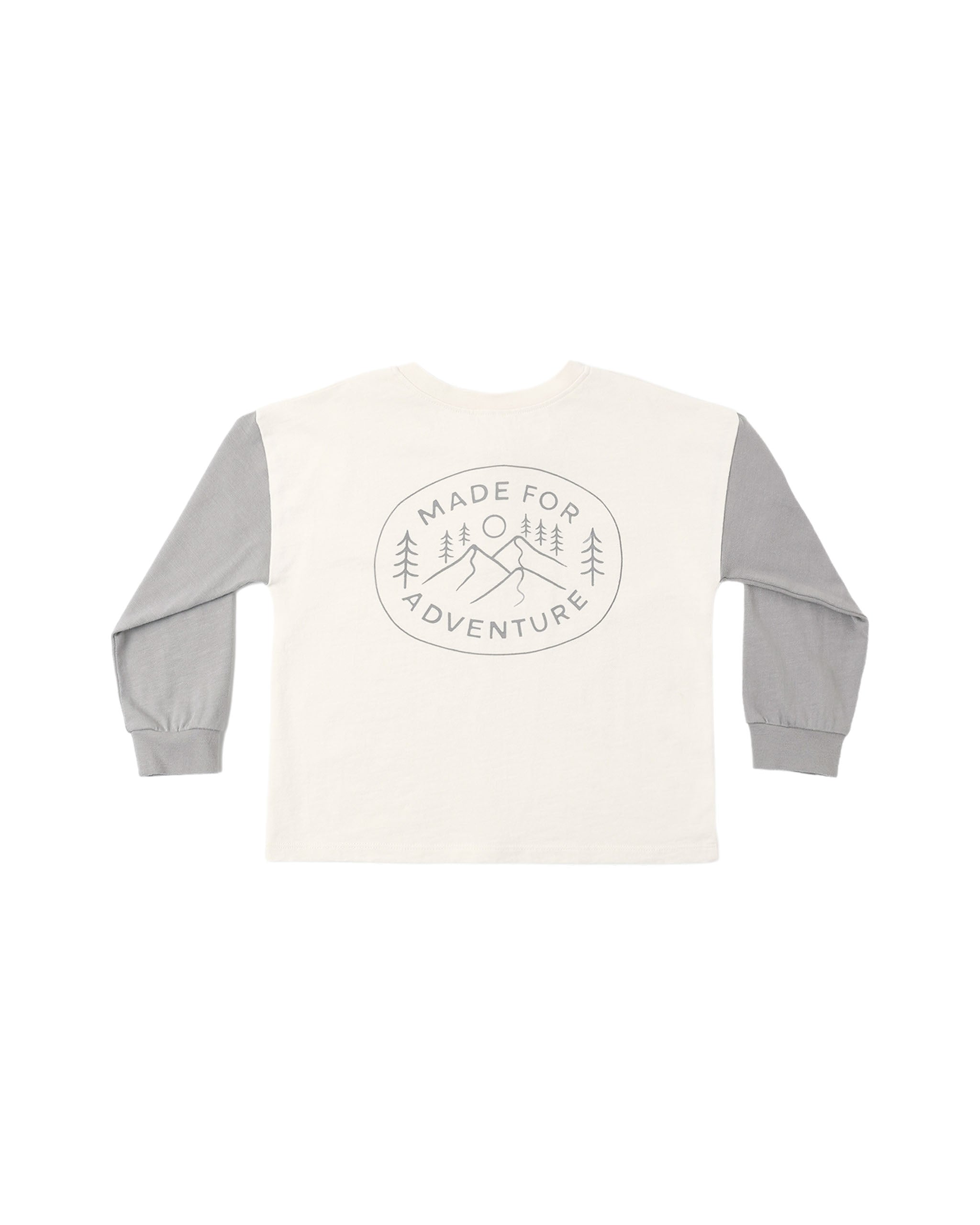 An ivory henley with a logo on the back that says "Made for Adventure".