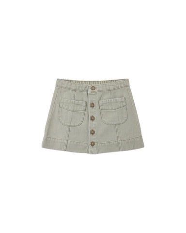 A light sage green denim mini skirt with a button-up front and two front patch pockets, shown flat on a white background.