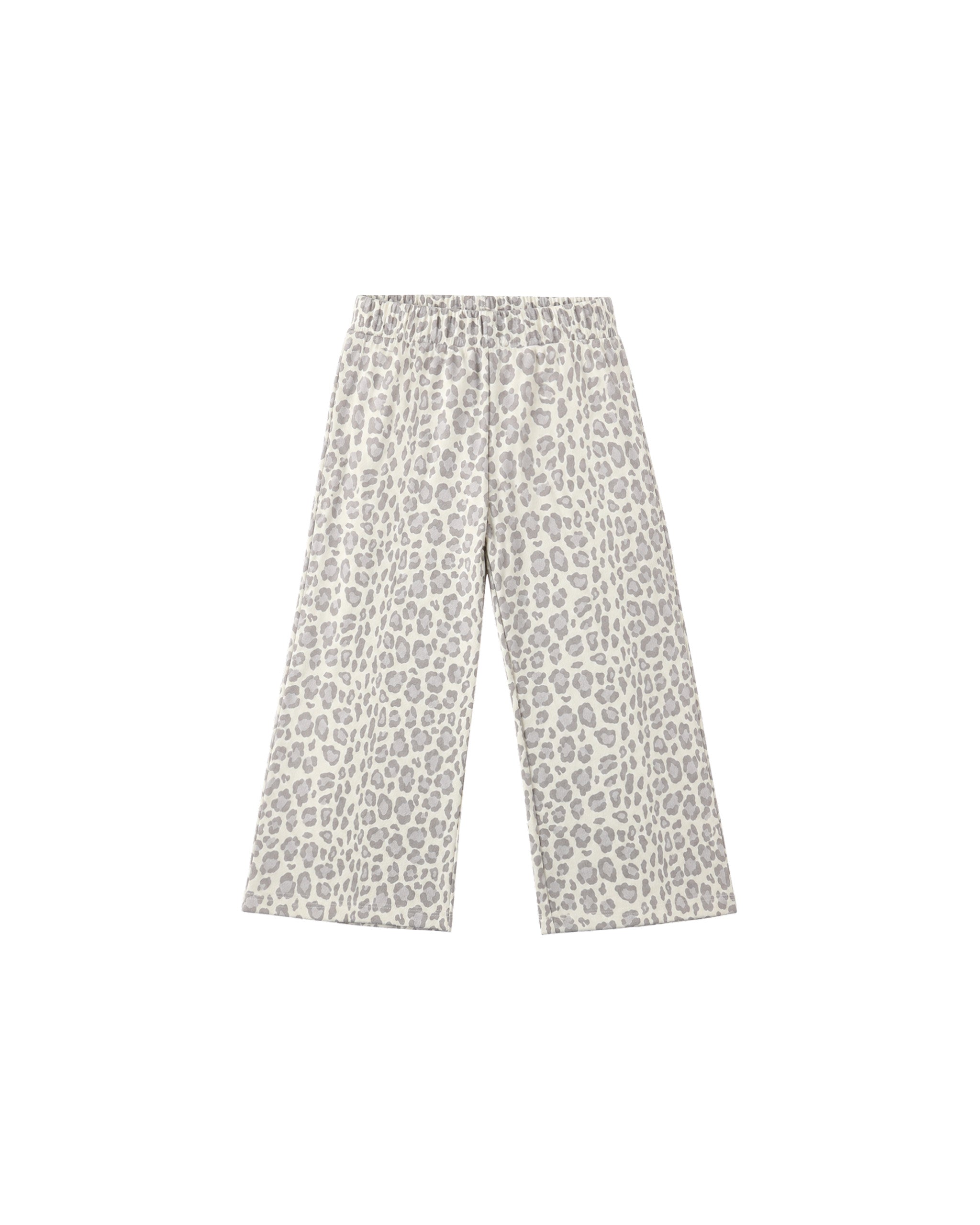 A pair of wide-leg sweatpants featuring a blue leopard print pattern on a light beige background, displayed flat against a solid white background.