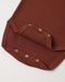 A brown colored onesie with snaps for easy diaper change on a white background
