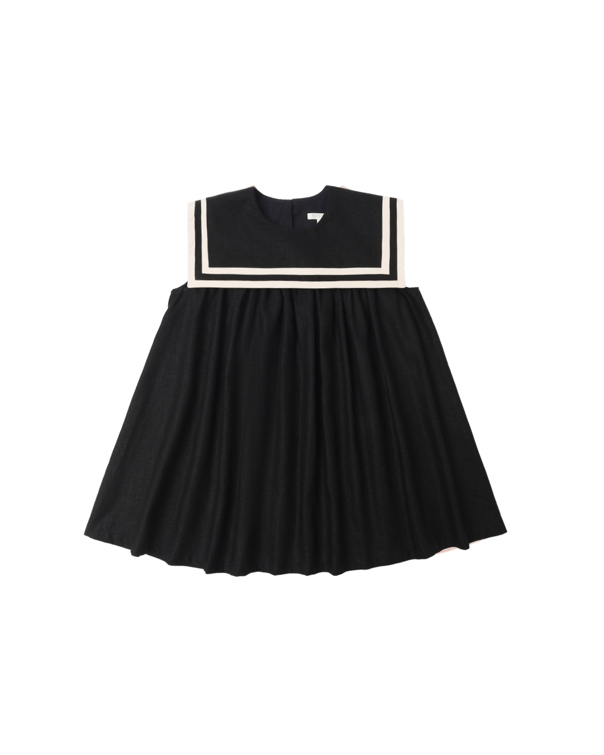 Black dress with white trim on a white background