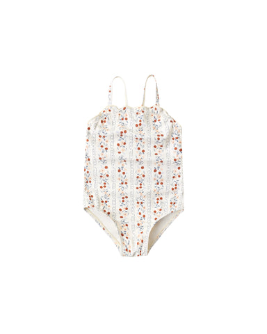 One-piece swimsuit with fruity pattern on a white background