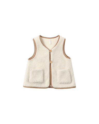 A cream-colored sherpa fleece vest with tan trim and two front patch pockets, shown flat on a white background.
