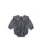 A baby girl's long-sleeve romper in a dark blue and white floral print, featuring a wide ruffled Peter Pan collar and a smocked bodice, shown flat on a white background.