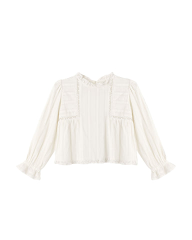 An off-white long-sleeve blouse with ruffled trim, a high ruffled collar, and a gathered peplum-style waist, shown against a plain white background.