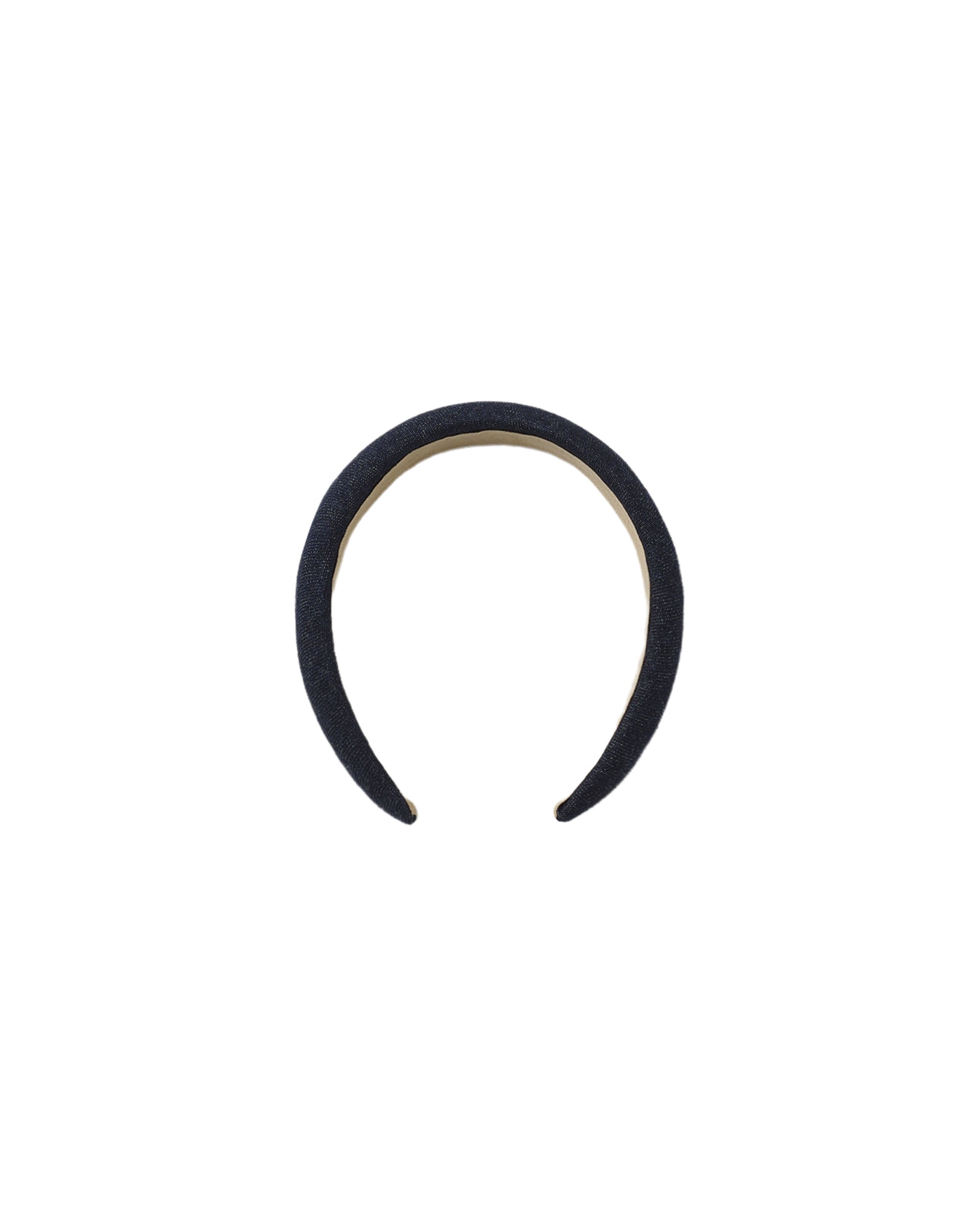 An indigo denim padded headband shown on a white background