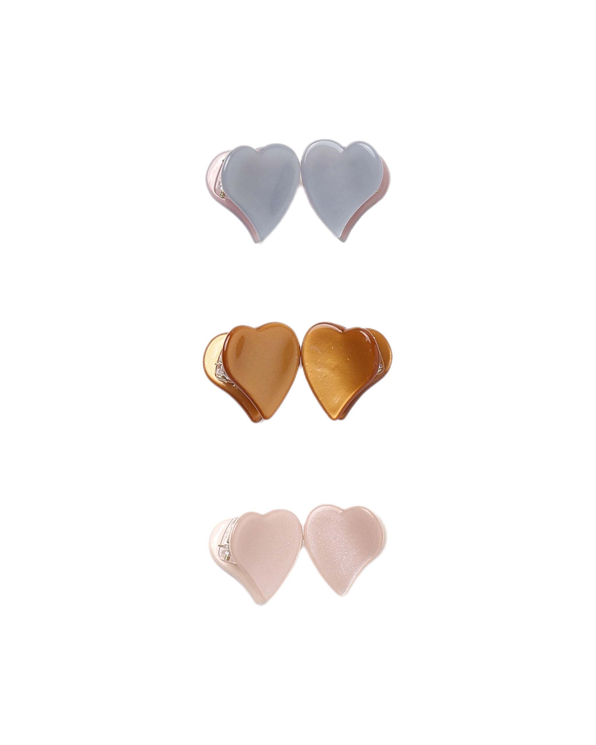 Heart shaped hair clips in dusty blue, clay and blush