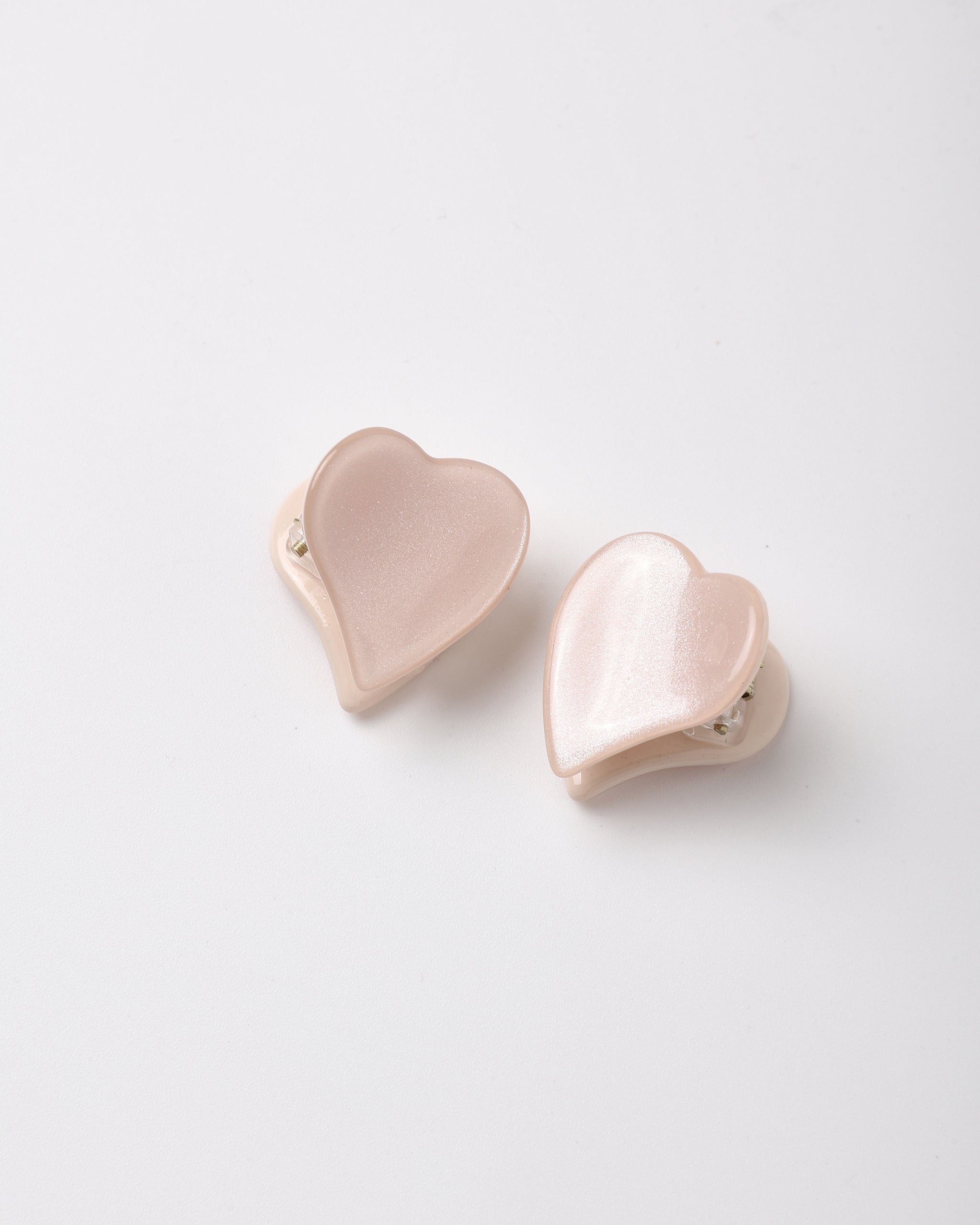 Blush colored heart shaped hair clips