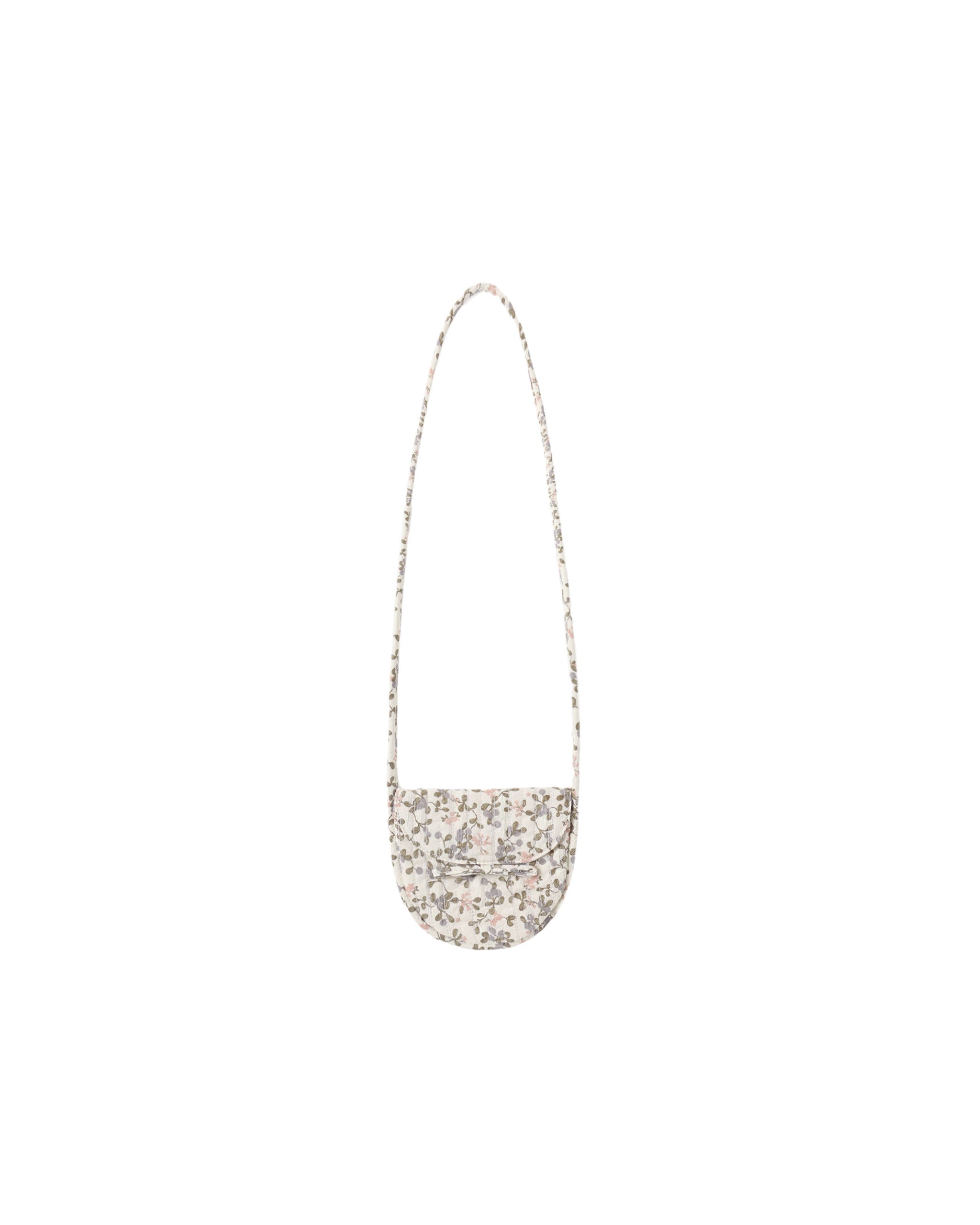 A small, semi-circular shoulder bag in a ivory floral pattern with a should strap, shown against a plain white background.