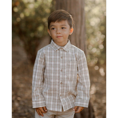 boy wearing ivory and pewter plaid long sleeve button down
