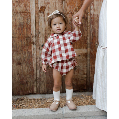 toddler girl wearing red and white checkered peter pan collar long sleeve flowy button down top with matching bloomers